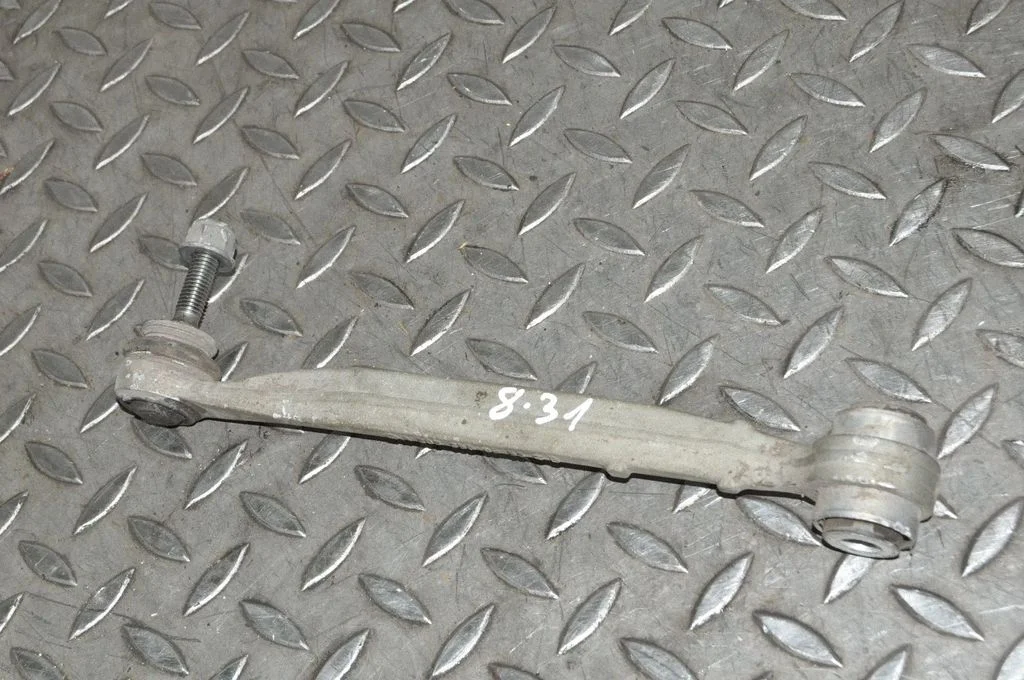 Rear upper control arm/wishbone – left