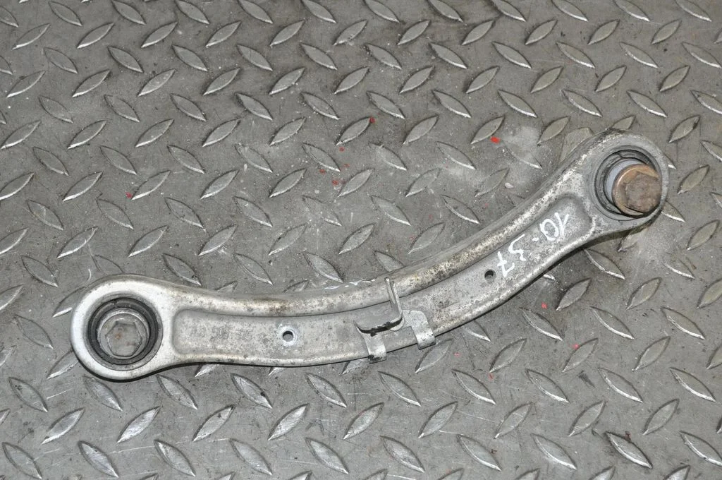 Rear upper control arm/wishbone – left