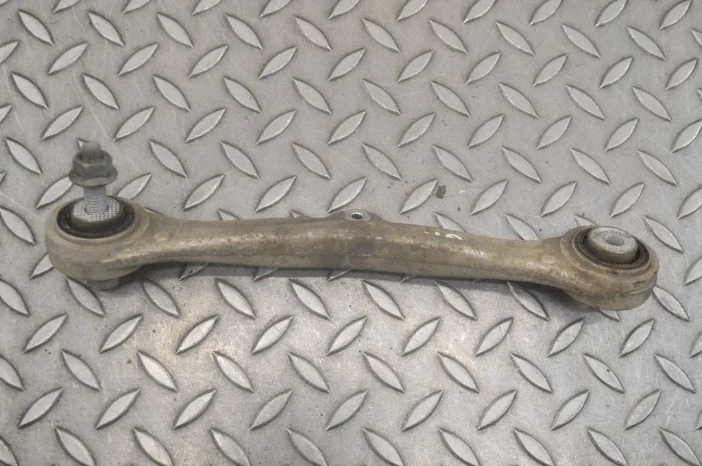Rear upper control arm/wishbone – left