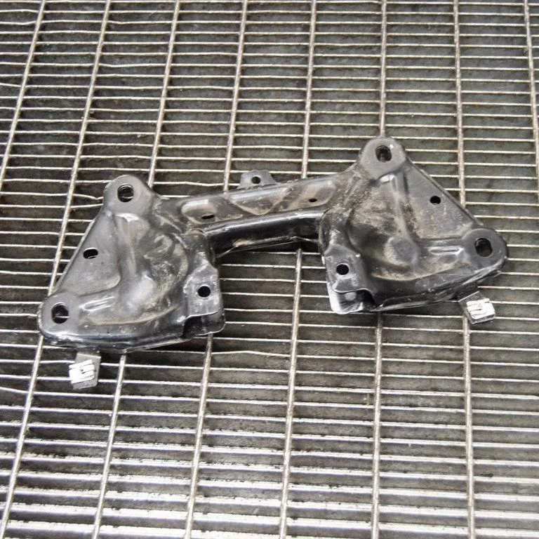 Gearbox mounting bracket 992399105B