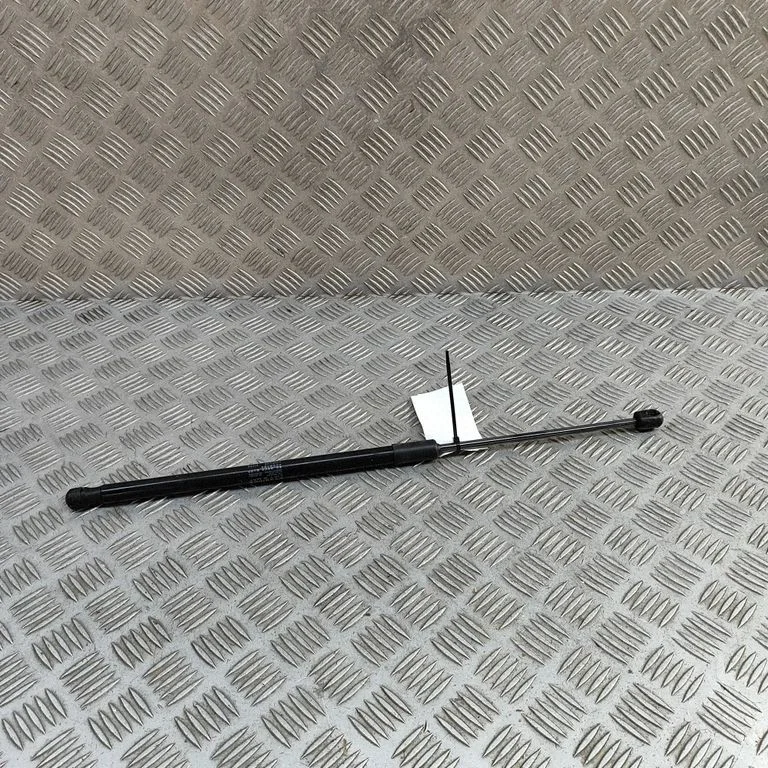 Front bonnet/hood damper/strut EKEA8402911