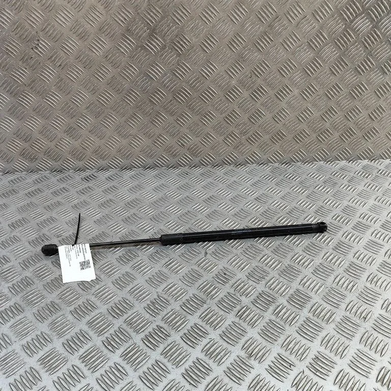 Front bonnet/hood damper/strut EKEA8402911