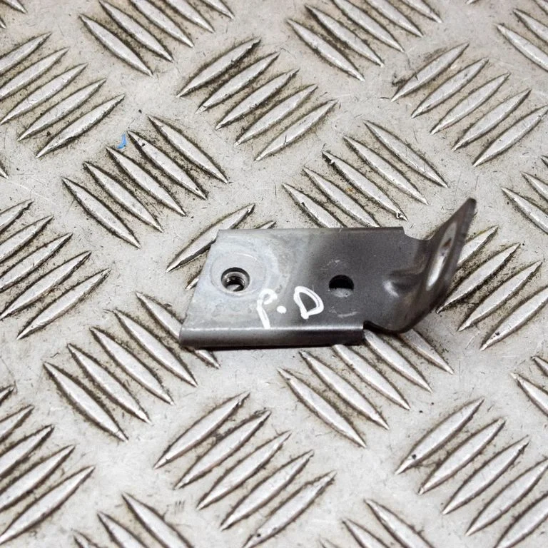 Fender mounting bracket FK7216A142AB