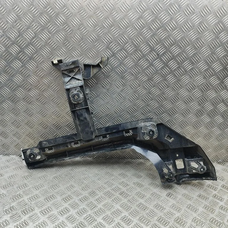 Rear bumper mounting bracket 7426440