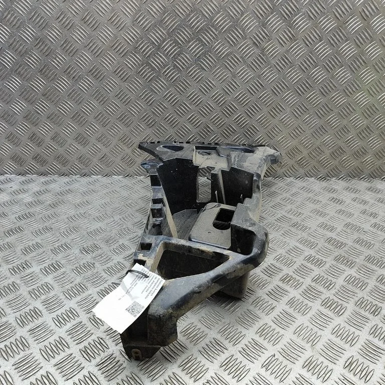 Rear bumper mounting bracket 7426437
