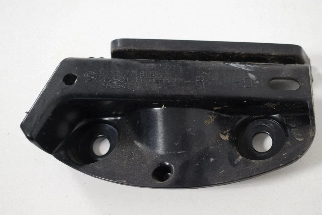 Aizmugurējā bufera turētājs 7118194