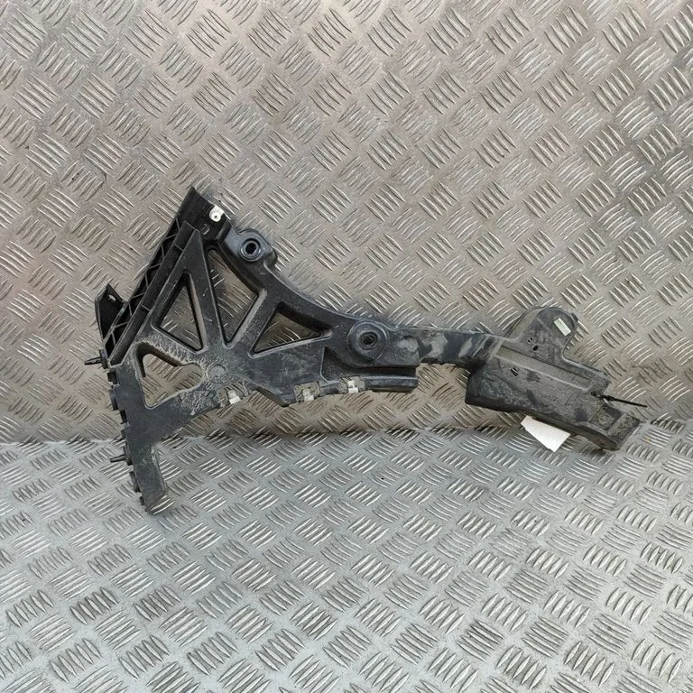 Rear bumper mounting bracket J9D317B930A