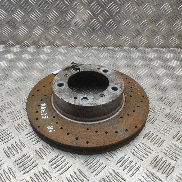Front brake disc 98735140101