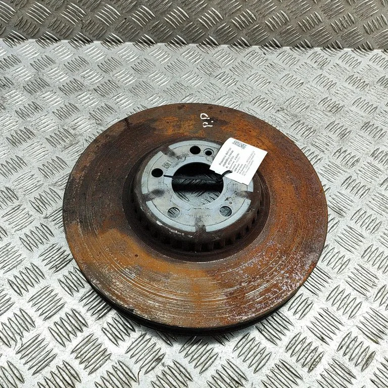 Front brake disc A0004211301