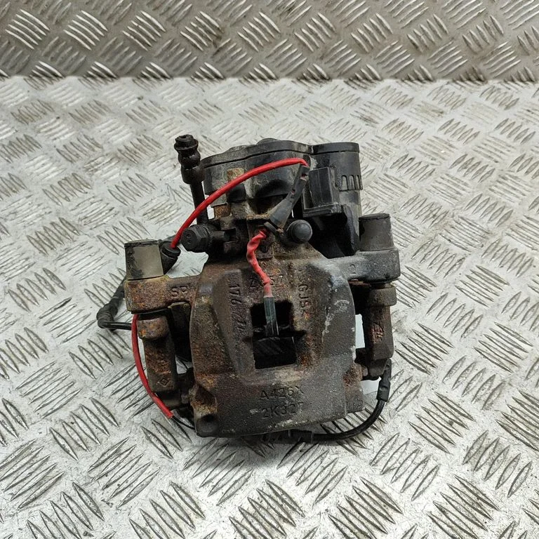 Aizmugurējais bremžu suports J9D32552AA