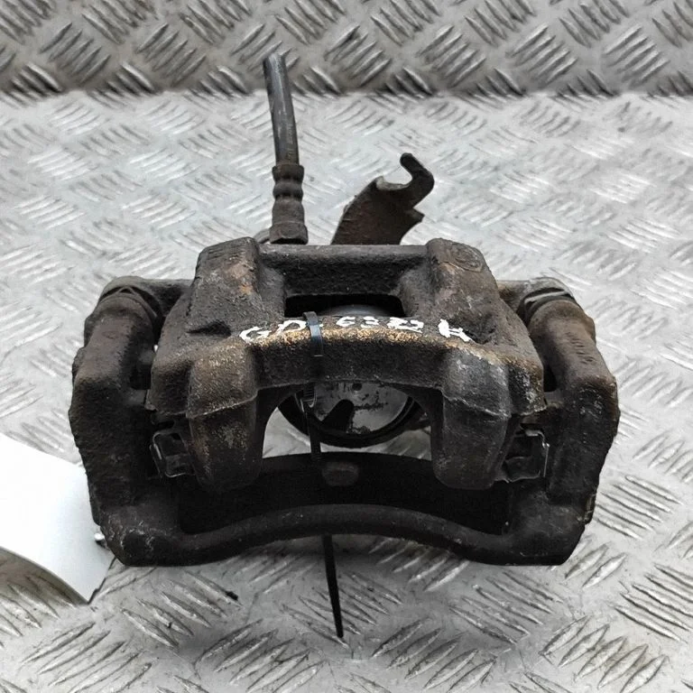 Rear brake caliper BK212B582AB