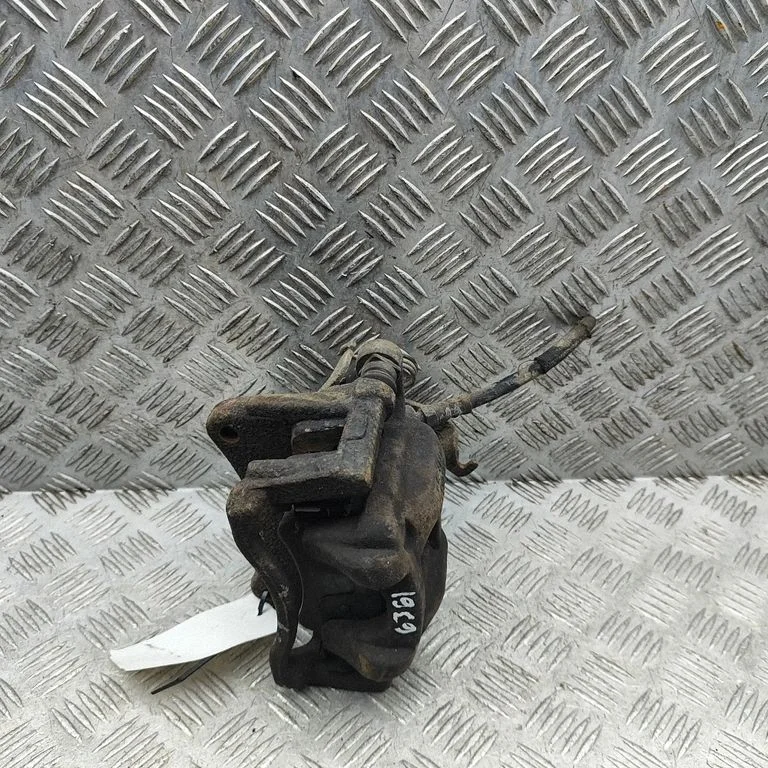 Rear brake caliper BK212B582AB