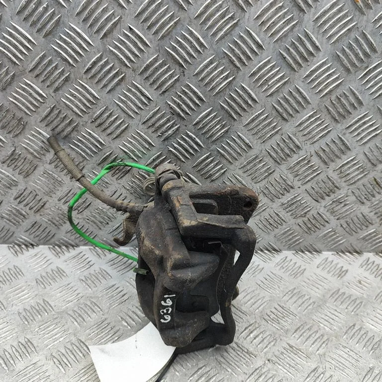 Rear brake caliper BK212B583AB