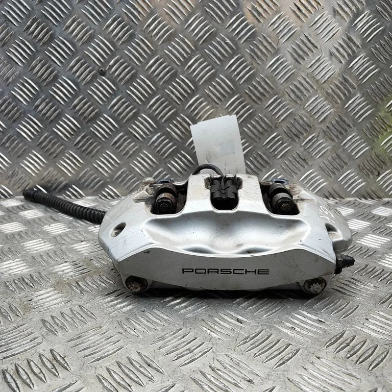 Aizmugurējais bremžu suports 7P0615423