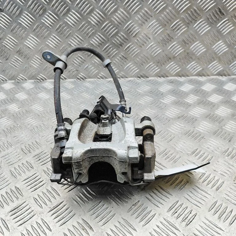 Rear brake caliper M8D22K328BB