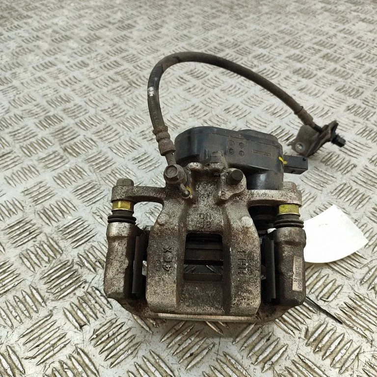 Aizmugurējais bremžu suports 58230EV600