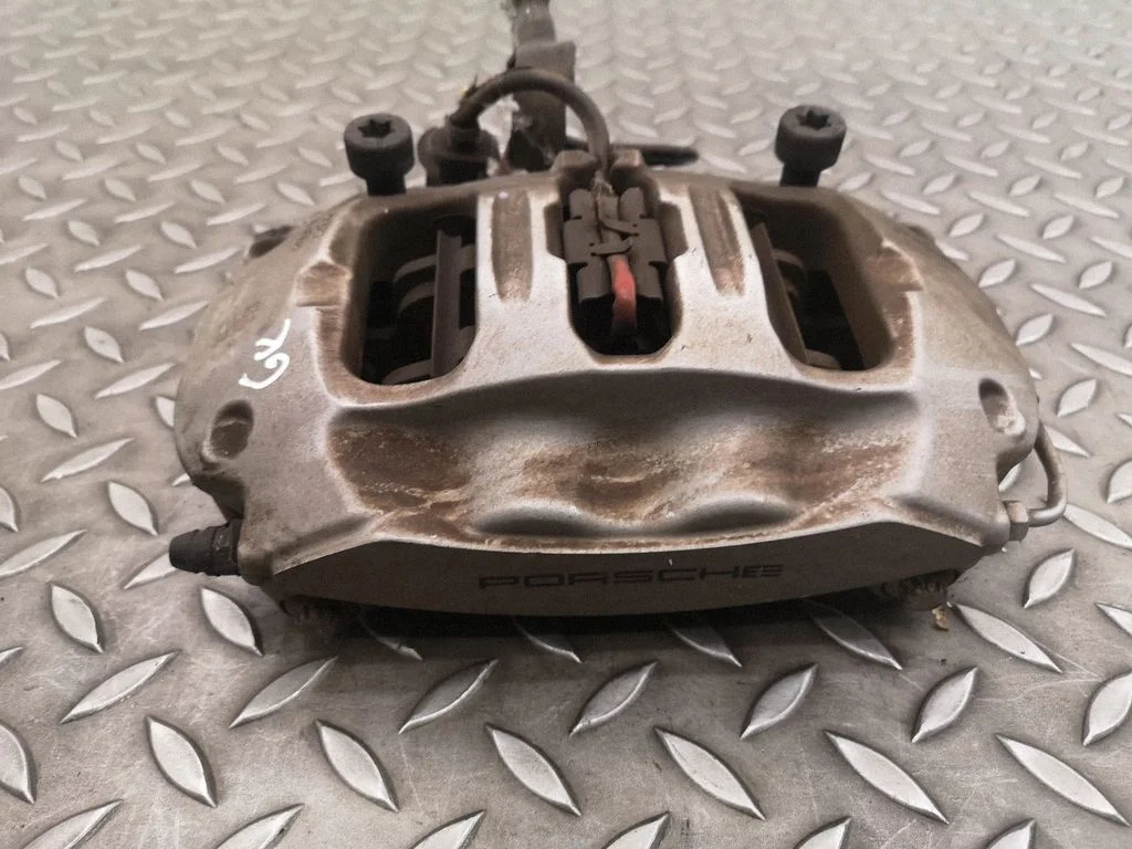 Rear brake caliper – left