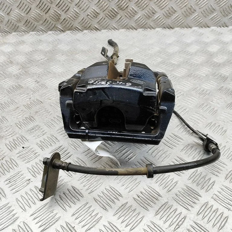 Rear brake caliper JK5M2553AA