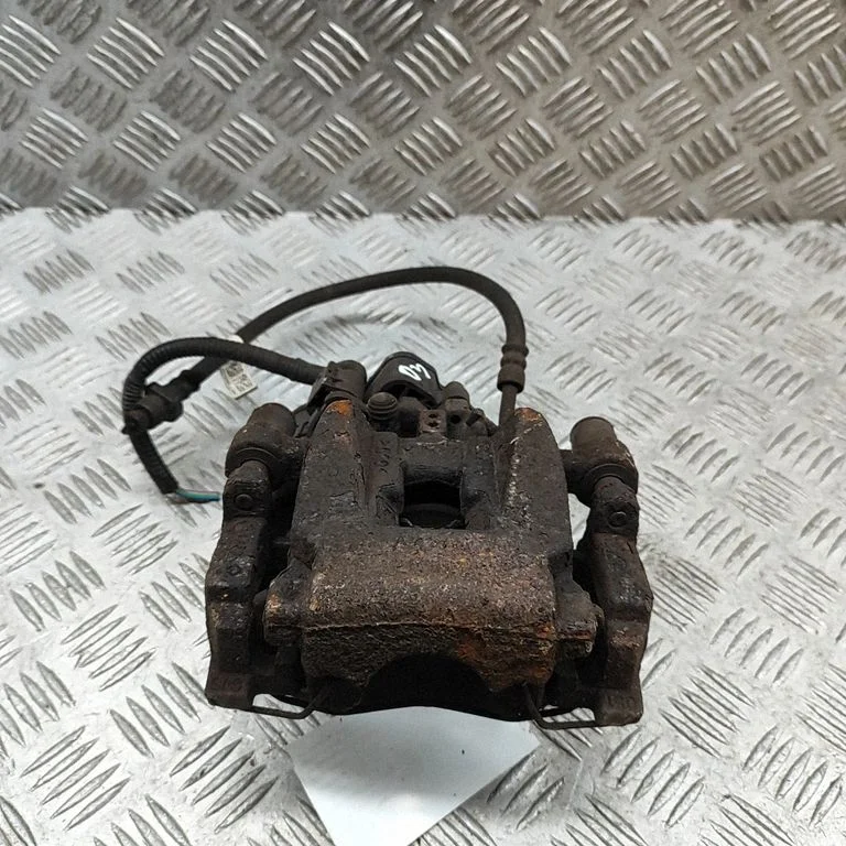 Rear brake caliper J9D32553AA