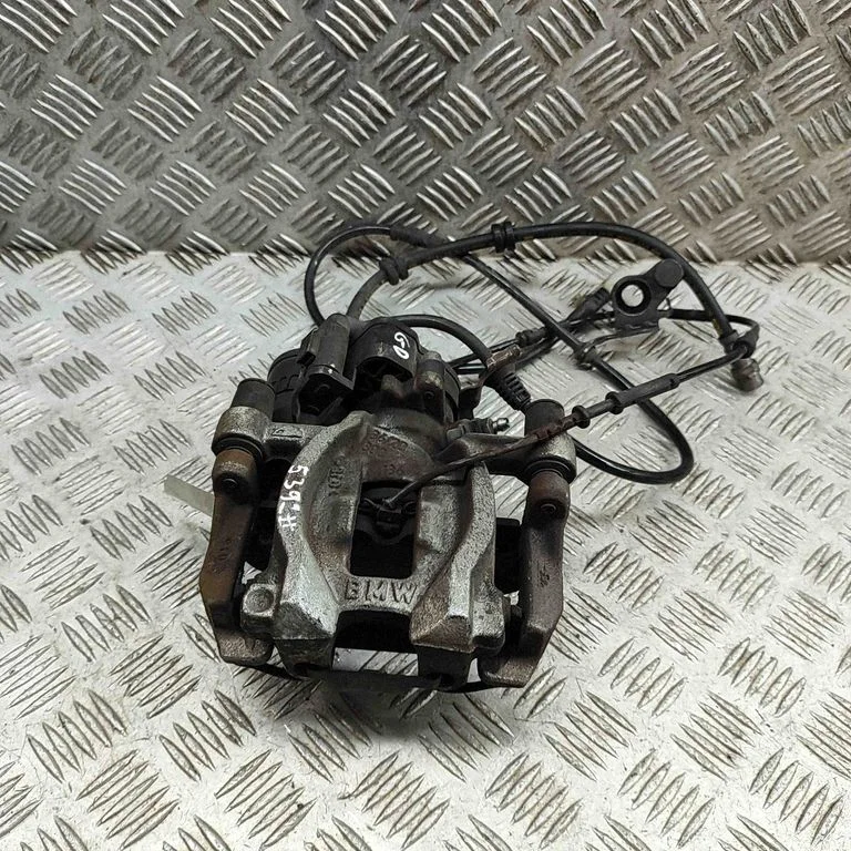 Rear brake caliper 6885542