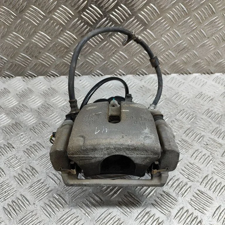 Rear brake caliper – right