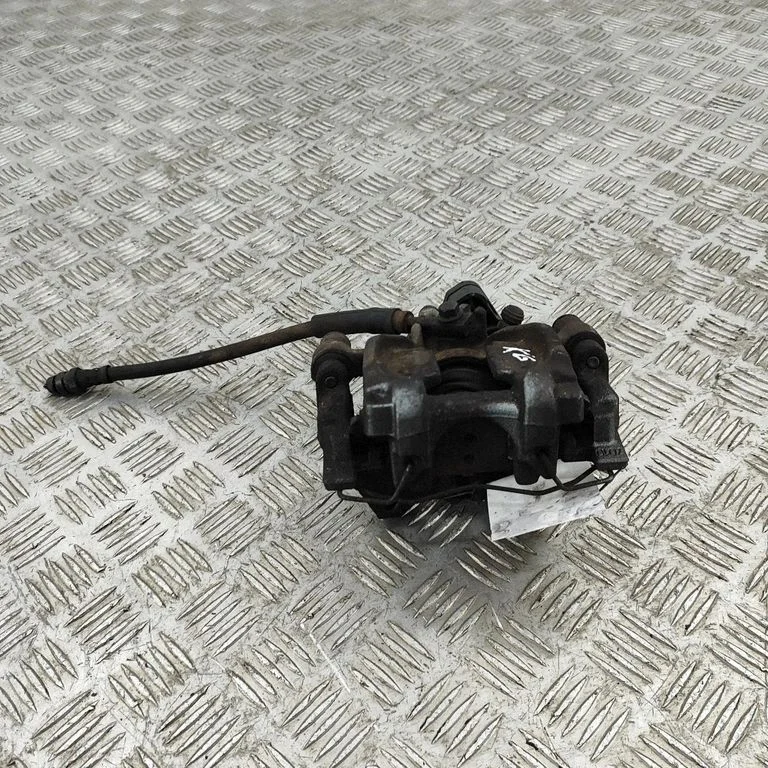 Aizmugurējais bremžu suports 5Q0615423E