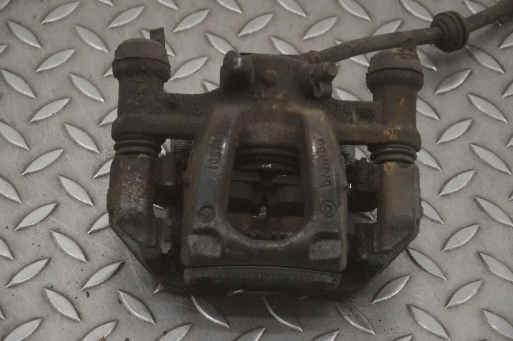 Rear brake caliper – right