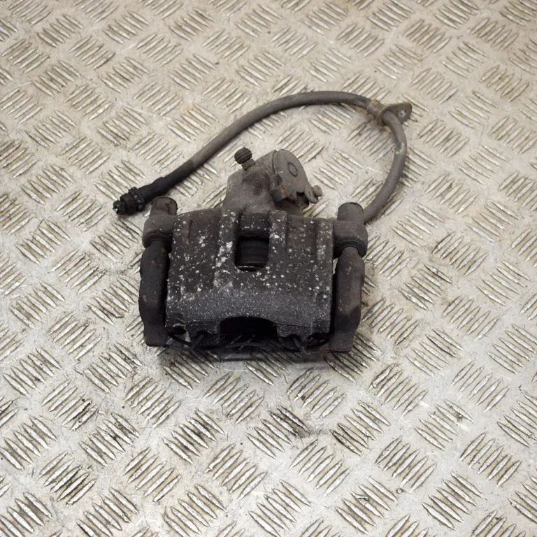 Rear brake caliper – right