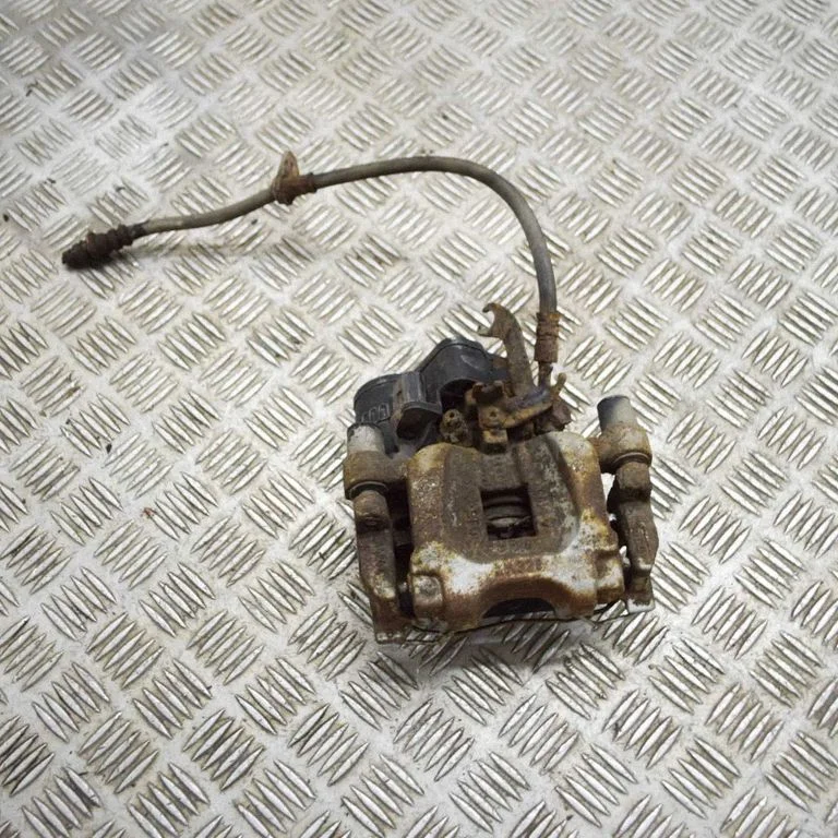 Rear brake caliper FK722K328BD