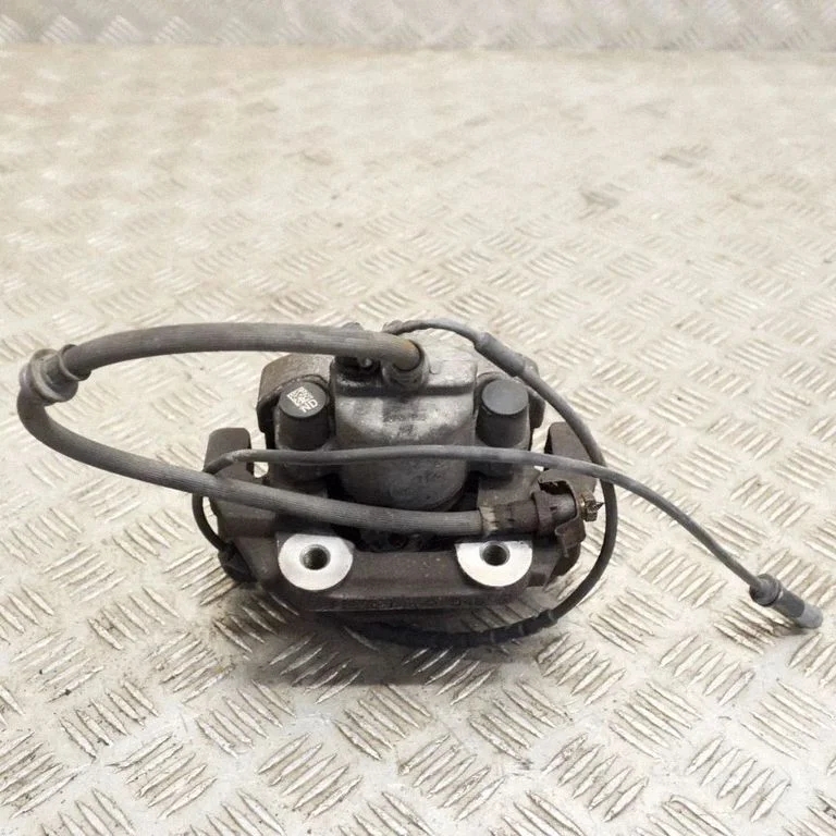 Rear brake caliper – right