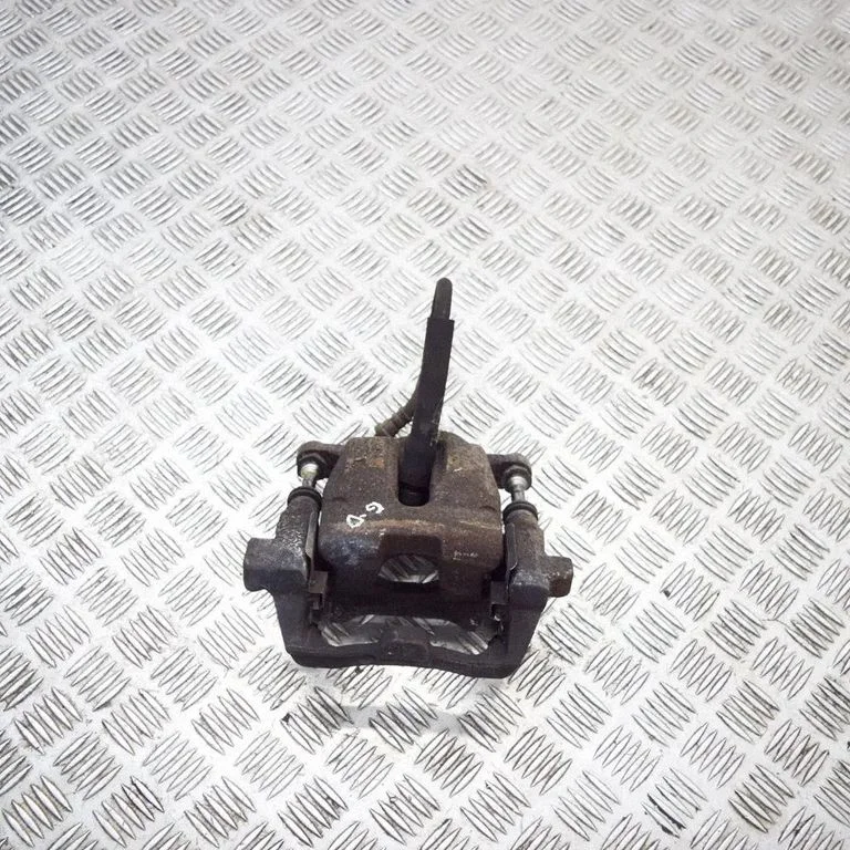 Rear brake caliper – right