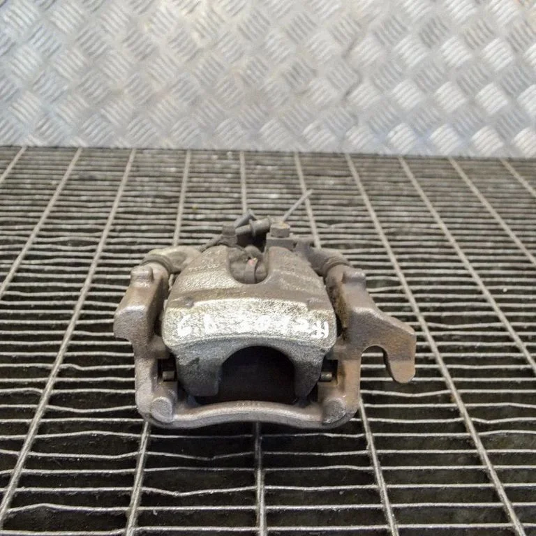 Rear brake caliper – right