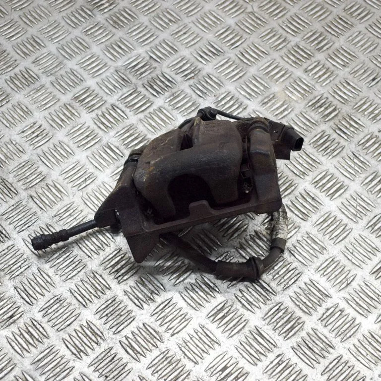 Rear brake caliper – left