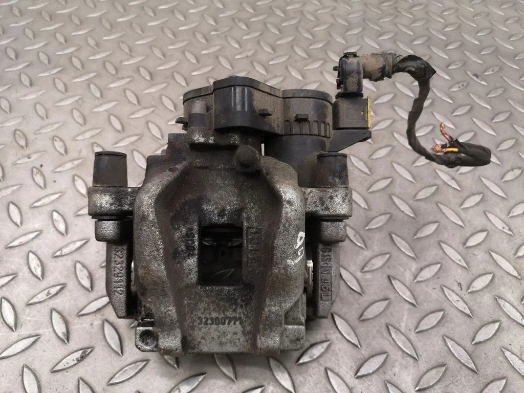 Rear brake caliper 32329111