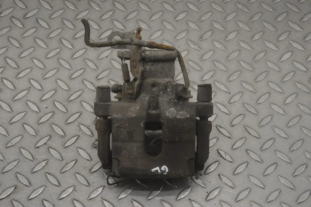 Rear brake caliper – right