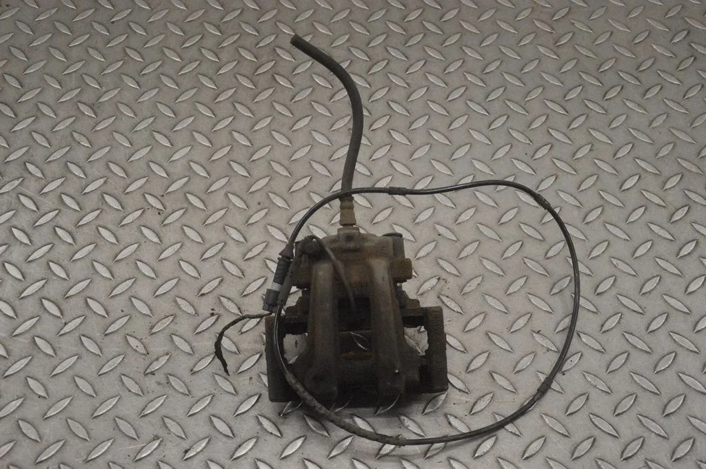 Rear brake caliper – right
