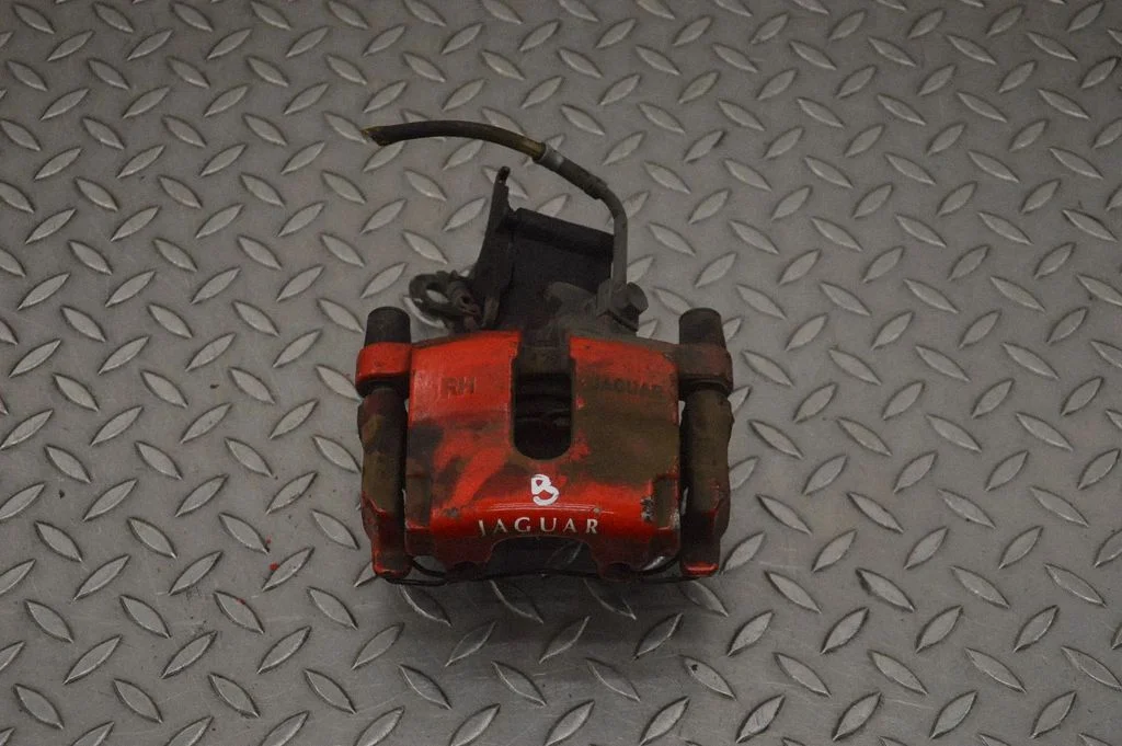 Rear brake caliper – right