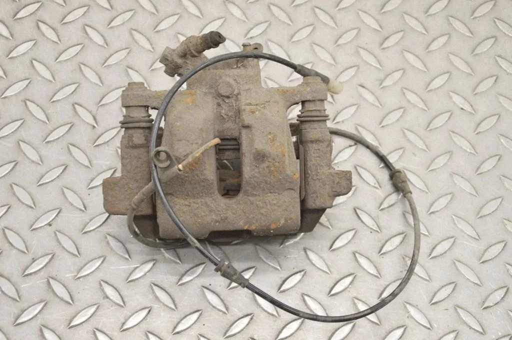 Rear brake caliper – right