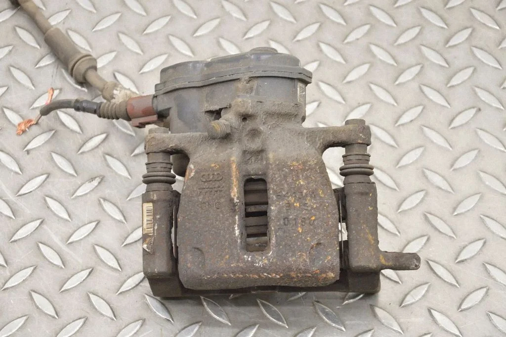 Rear brake caliper – right
