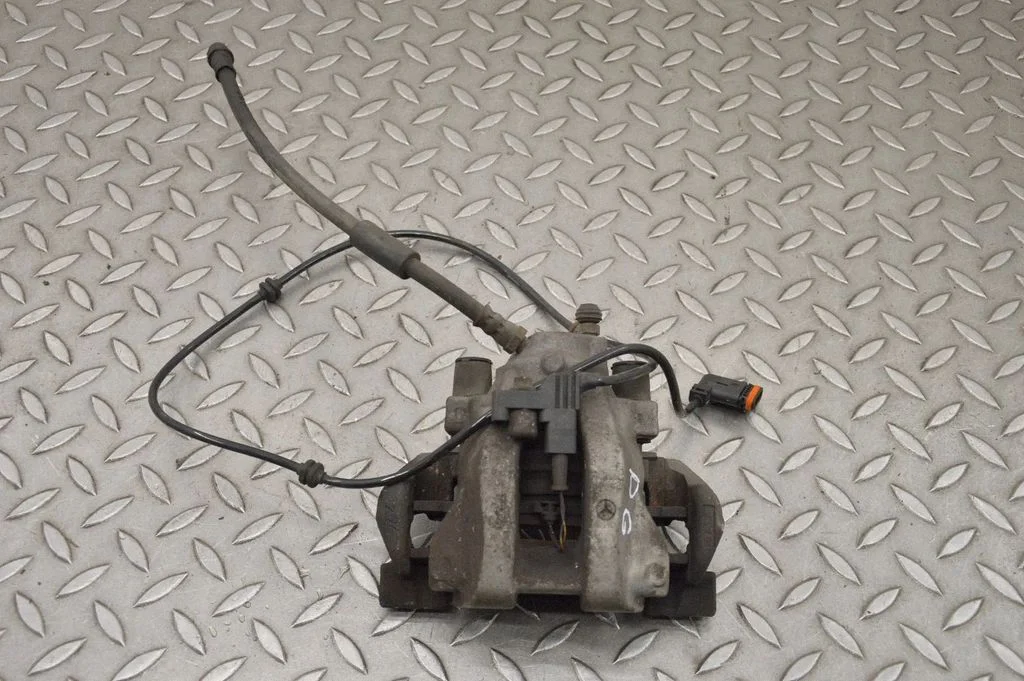 Rear brake caliper – right