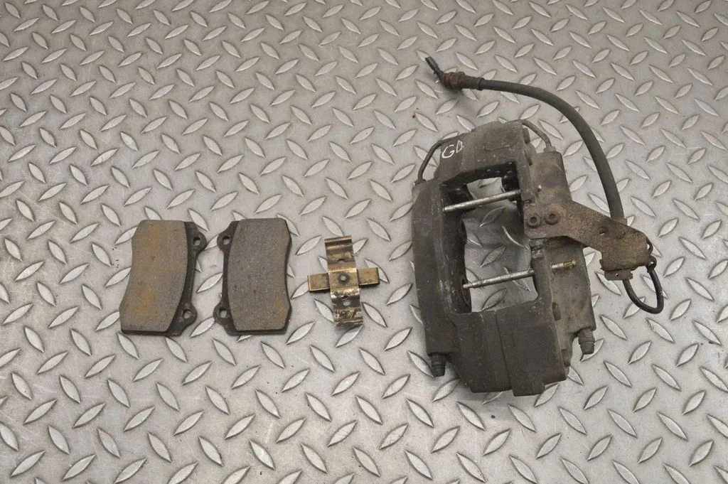 Rear brake caliper – right