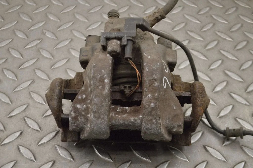 Rear brake caliper – right