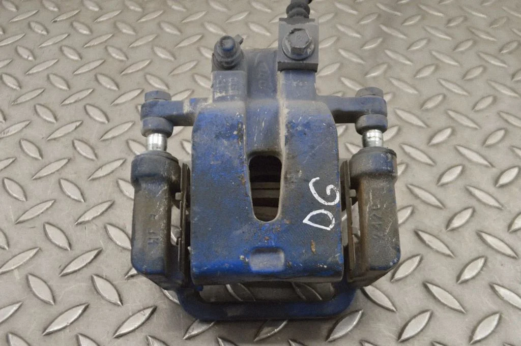 Rear brake caliper – right