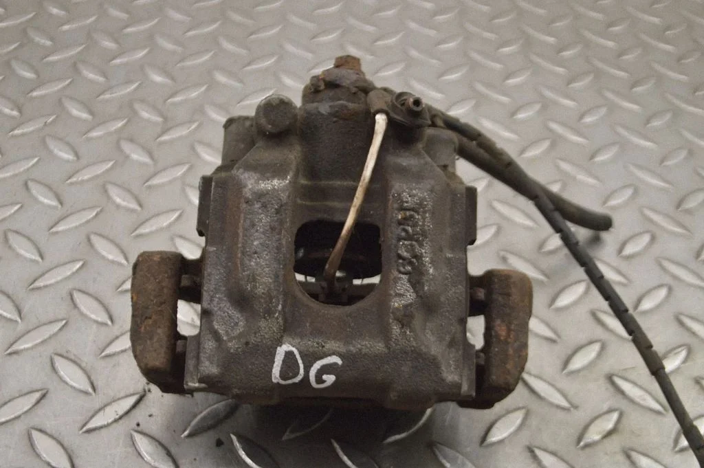 Rear brake caliper – right