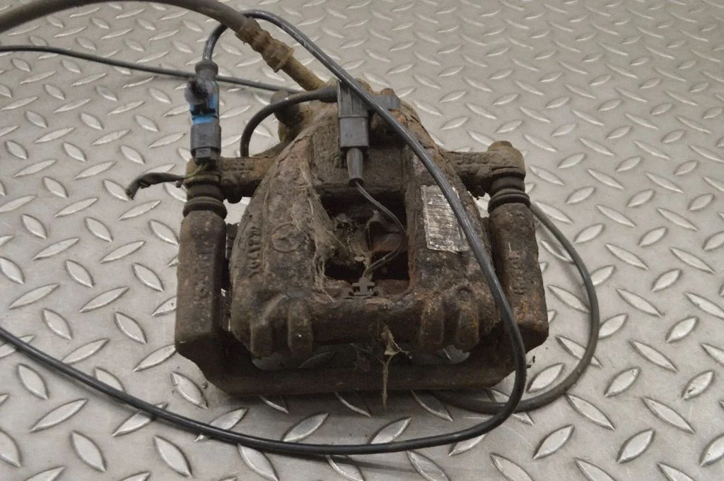 Rear brake caliper – right