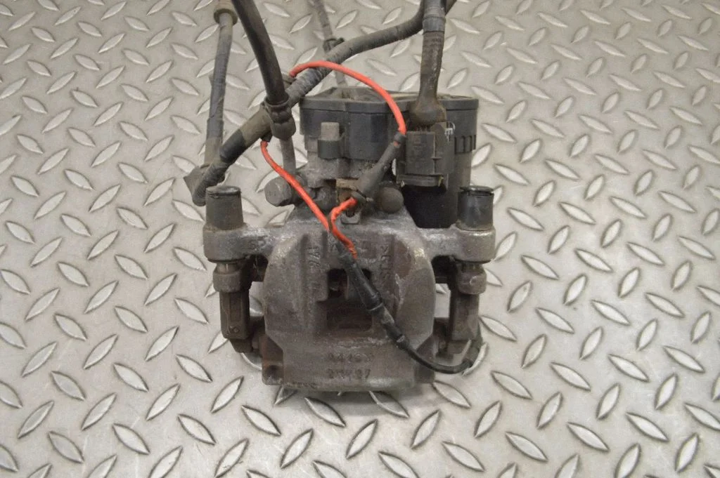 Rear brake caliper J9D32K327AB