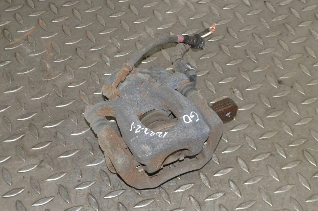 Rear brake caliper – right