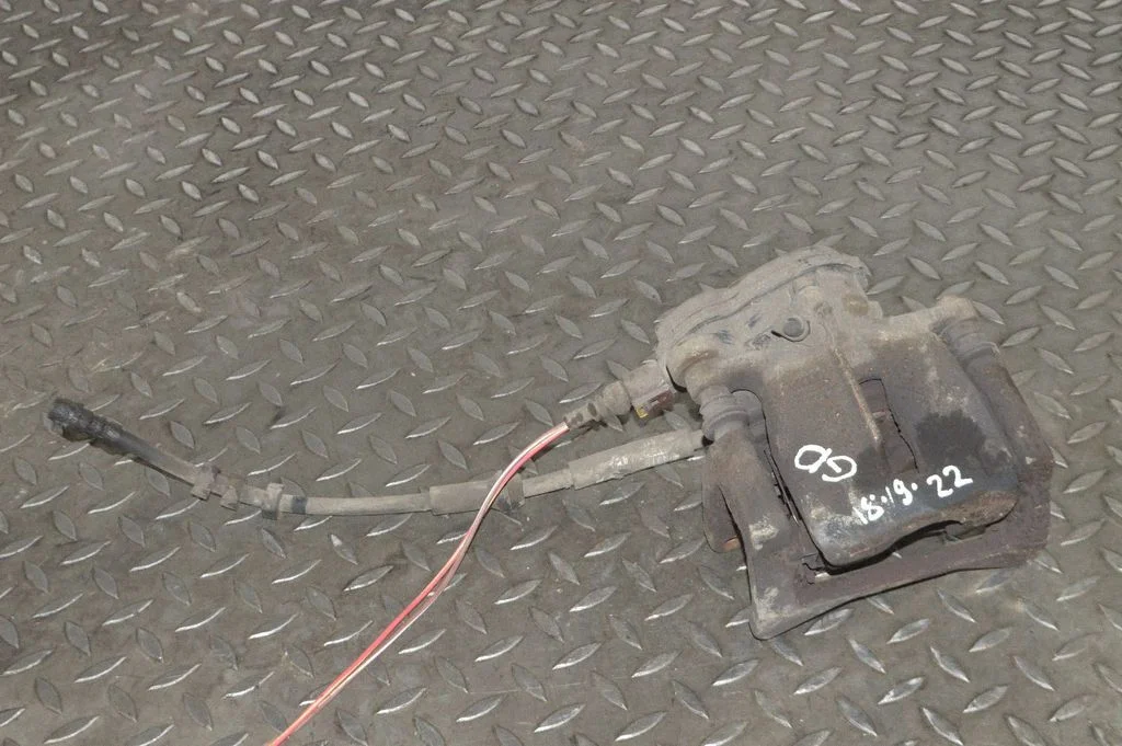 Rear brake caliper – right