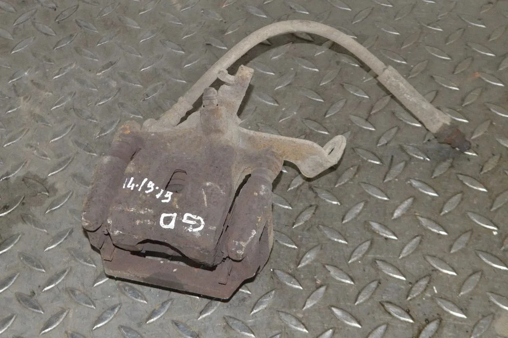 Rear brake caliper – right