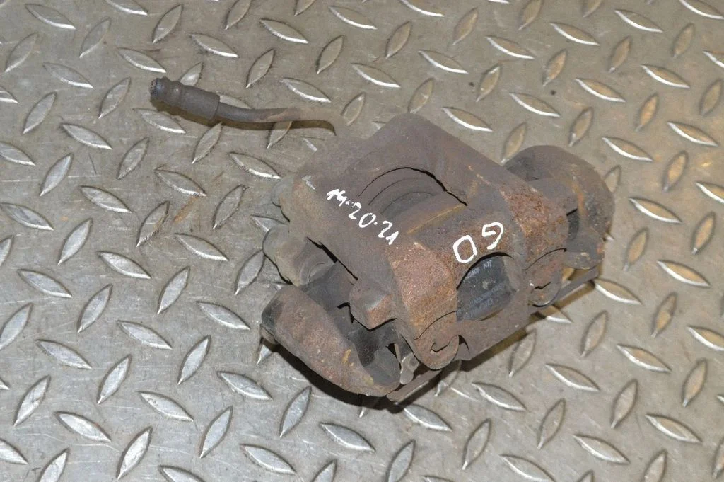 Rear brake caliper – right